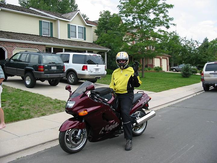 Dad going for a ride on Zed.jpg